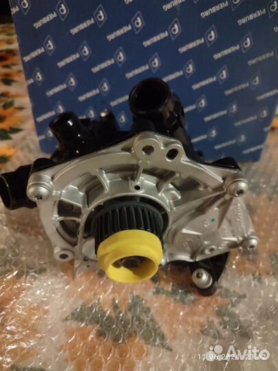 Помпа в сборе с термостатом VAG