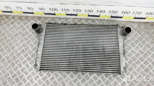 Радиатор интеркулера toyota avensis T25 (93Y34KC01