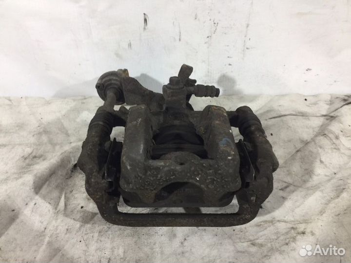 Суппорт тормозной задний правый Opel Astra J До