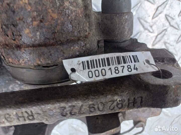 Суппорт передний левый Volvo XC70 1 (SZ,LZ)