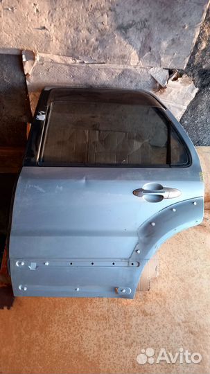 Ford Escape тайванец 2007-09 задняя левая дверь