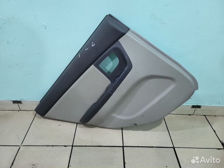 Обшивка двери задняя левая Kia Cerato 1