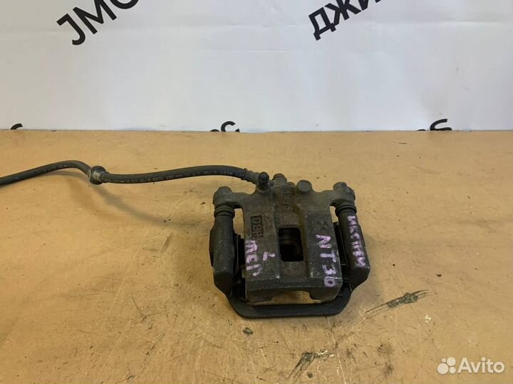 Тормозной суппорт зад. левый Nissan X-Trail