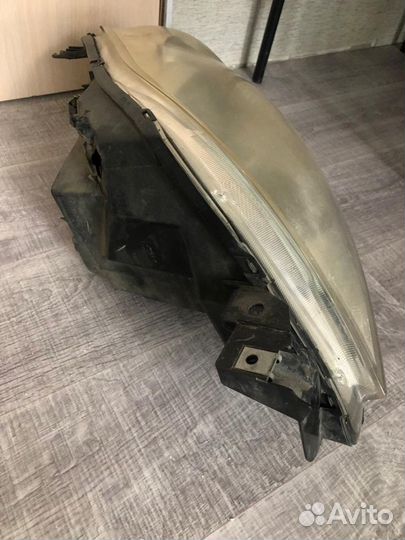 Фара mazda demio