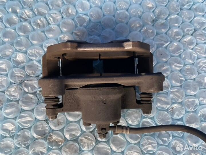 Суппорт передний левый Nissan Maxima A35 VQ35DE