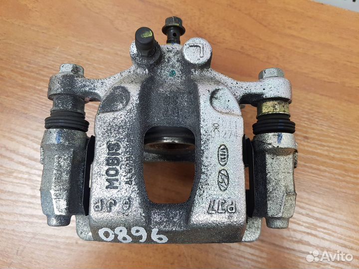 Суппорт задний левый Sportage (QL) 2016-2021