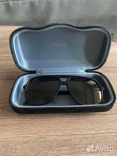 Солнцезащитные очки Gucci