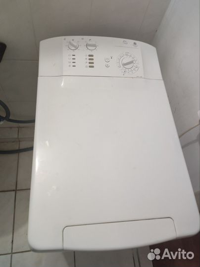 Стиральная машина автомат с вертикальной загрузкой