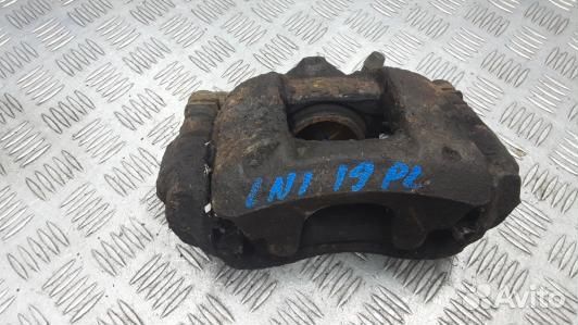 Суппорт тормозной передний левый toyota avensis T2