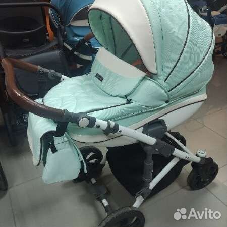 Коляска тутис