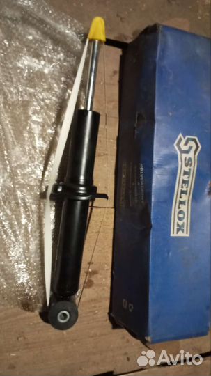 Задняя стойка амортизатор Ауди с100