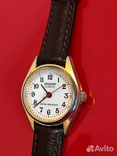 Часы sharp