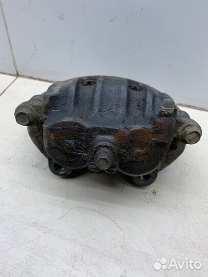 Суппорт передний правый Nissan Liberty QR20 2.0