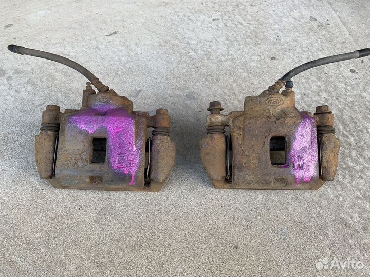 Суппорт передний Kia Spectra