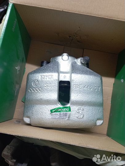 Тормозной суппорт передний левый VW, новый