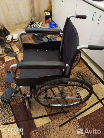 Инвалидное кресло