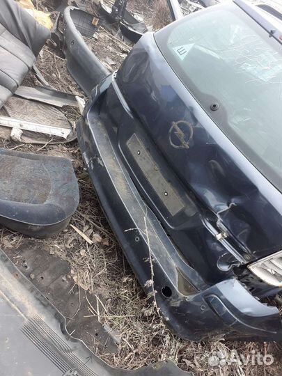 Задний бампер Opel Astra H