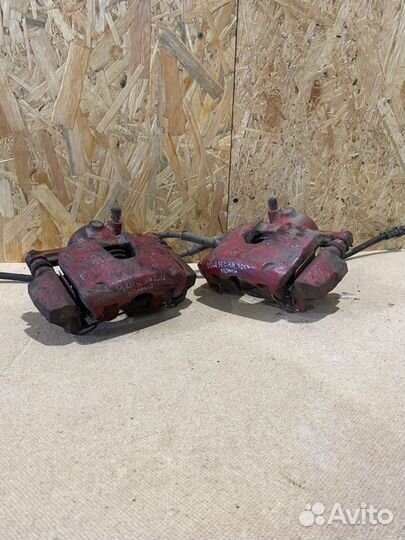 Суппорт тормозной передний Volkswagen Polo cедан