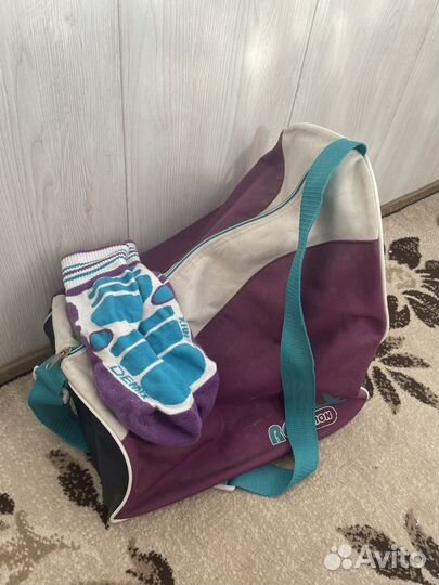 Роликовые коньки