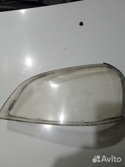 Стекло фары лачетти