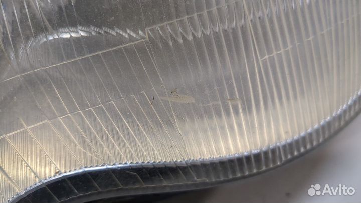 Фара (передняя) левая Mercedes C W203