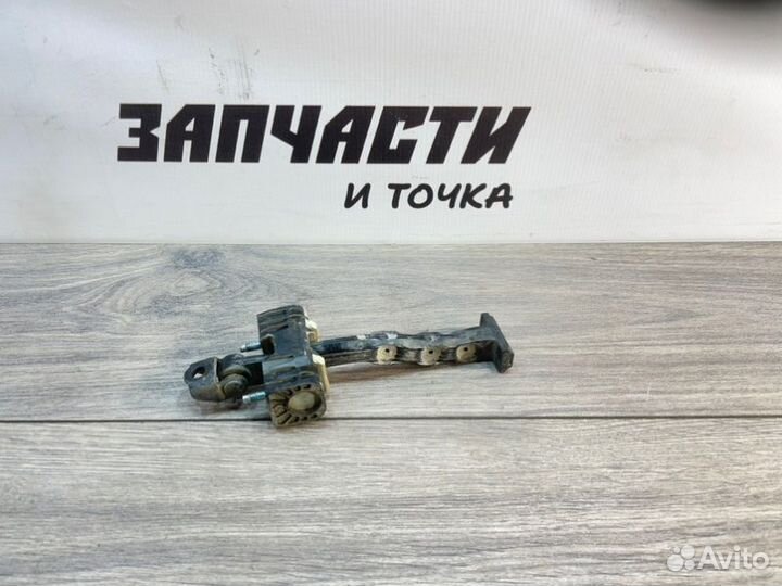 Ограничитель двери передний левый Opel Astra H