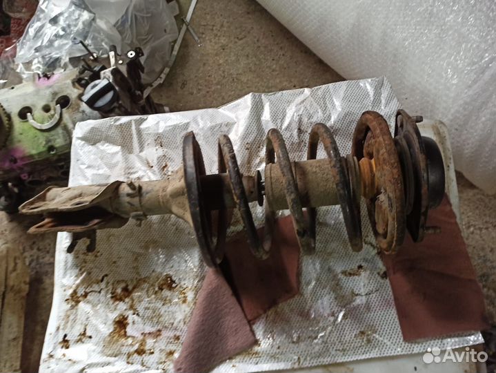 Передняя стойка proton persona Mitsubishi mirage