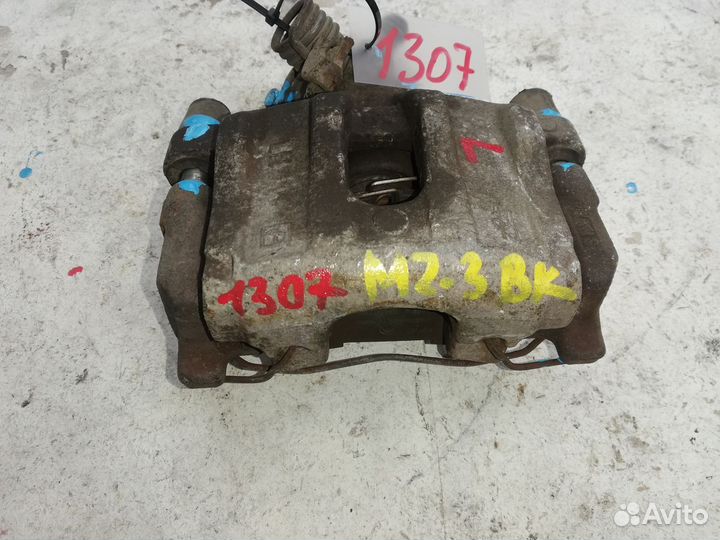 Суппорт тормозной задний левый Mazda 3 (BK) I рест