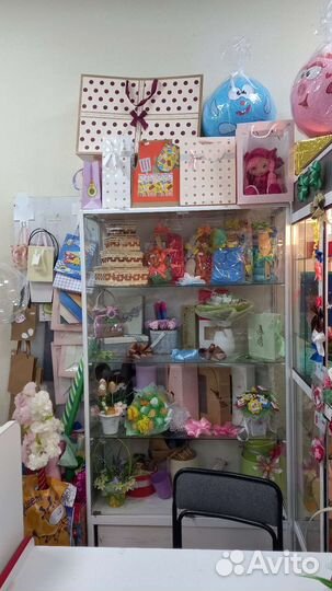 Островок упаковки подарков.Торг