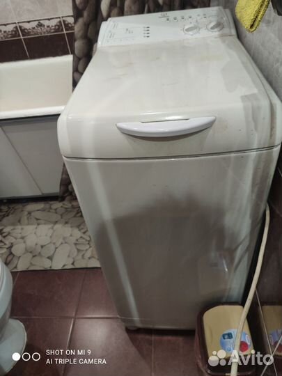 Стиральная машина с вертикальной загрузкой