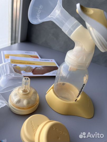 Молокоотсос medela ручной с соской, накладки