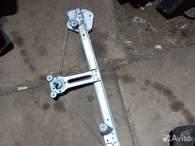 Передний левый стеклоподъёмник Логан 1