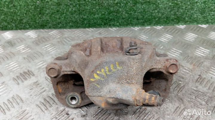 Суппорт Ssangyong Musso Левый Передний