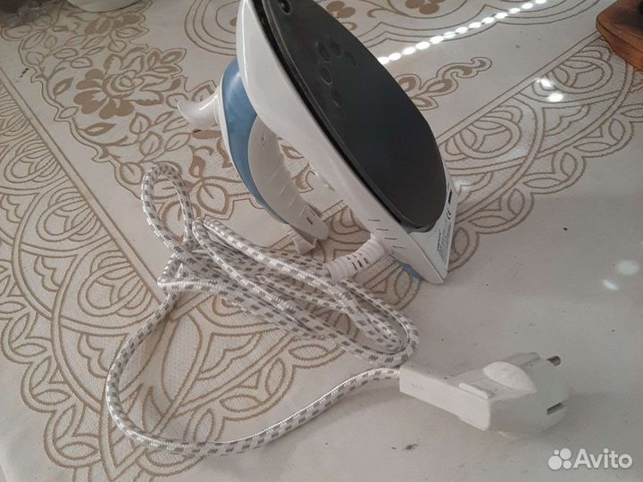 Маленький дорожный утюжок