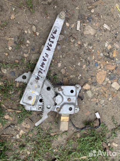 Стеклоподьемник задний левый Mazda Familia