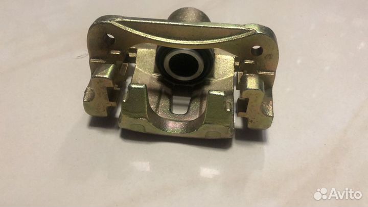 Суппорт тормозной Chery Tiggo задний левый 2WD (Ch