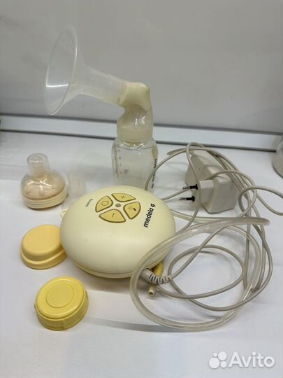 Молокоотсос medela электрический