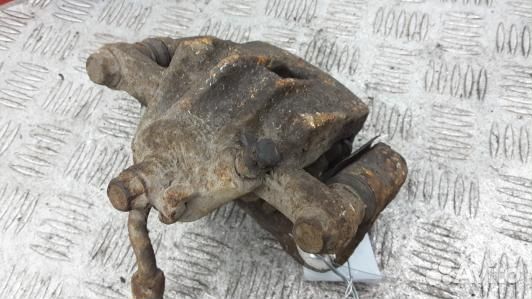 Суппорт тормозной задний левый KIA soul 1 (1UK18LS