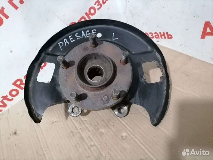 Передний левый поворотный кулак Nissan Presage