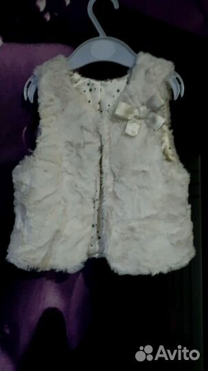 Жилетка нарядная меховая