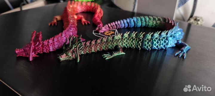 Дракон игрушка антистресс на шарнирах цветной