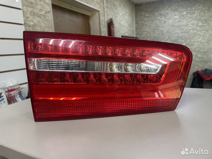 Фонарь левый в крышку багажника Ауди А6 С7