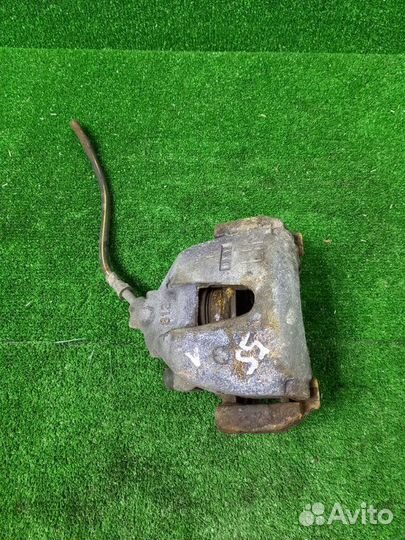 Суппорт тормозной передний левый Ford Focus shda