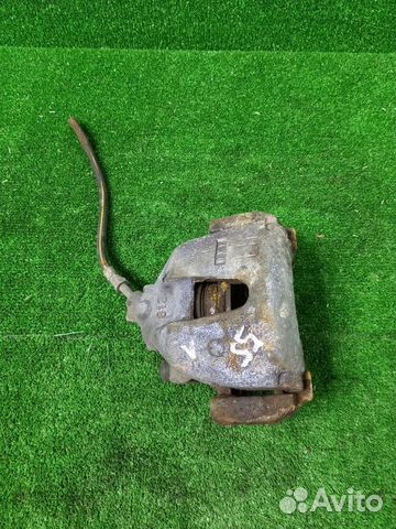 Суппорт тормозной передний левый Ford Focus shda