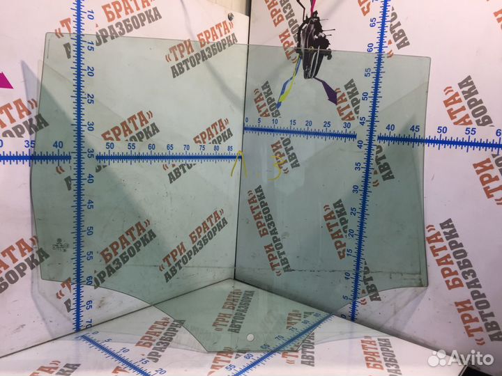 Фольксваген Пассат Стекло заднее Лев