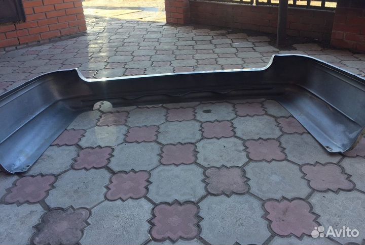 Бампер задний Nissan Avenir