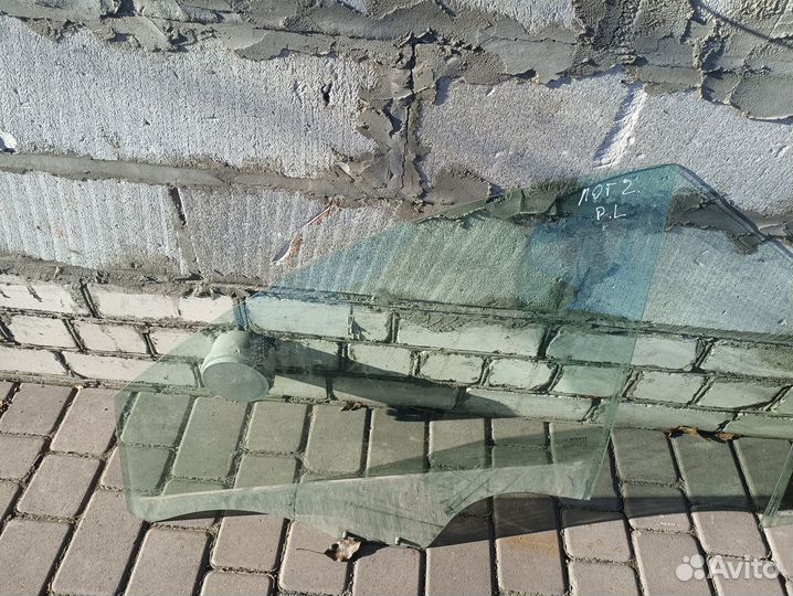 Стекло передней левой двери Renault Logan 2