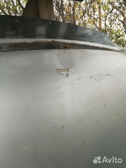 Капот Opel Astra G