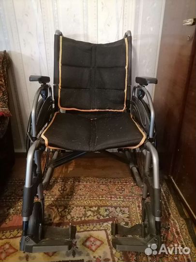 Инвалидная коляска