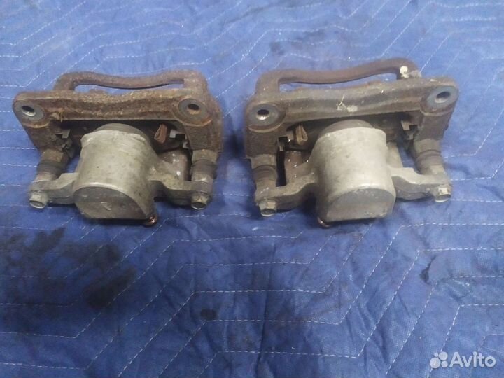 Суппорт задний Kia Sorento 2 XM Santa Fe 2 CM